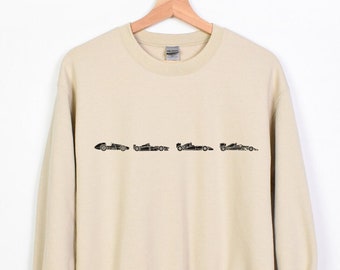 Maglione raffigurante l'evoluzione di una monoposto di F1, felpa girocollo di Formula 1, gadget di Formula 1 per il weekend di gara, regali vintage di Formula 1, maglione di Formula Uno.