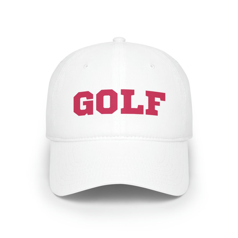 May include: White baseball cap with a red "GOLF" embroidered on the front.