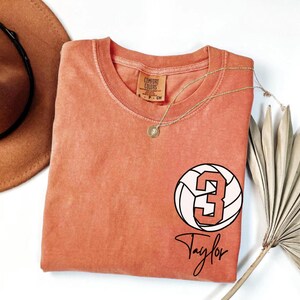 Yam Comfort Colors 1717 t-shirt with a customizable name and number volleyball graphic.