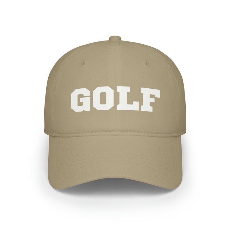 May include: A tan baseball cap with a white embroidered "GOLF" in a bold font.