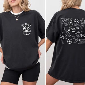 custom soccer t-shirt featuring a unique doodle graphic on the front and back. Customize the team name on the front and player number on the back to show your team pride. Crafted with the comfort colors 1717 tee