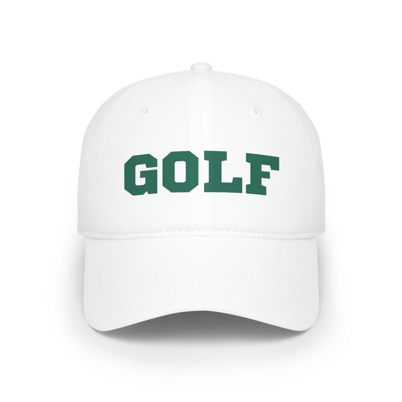 May include: White baseball cap with a green "GOLF" text on the front.