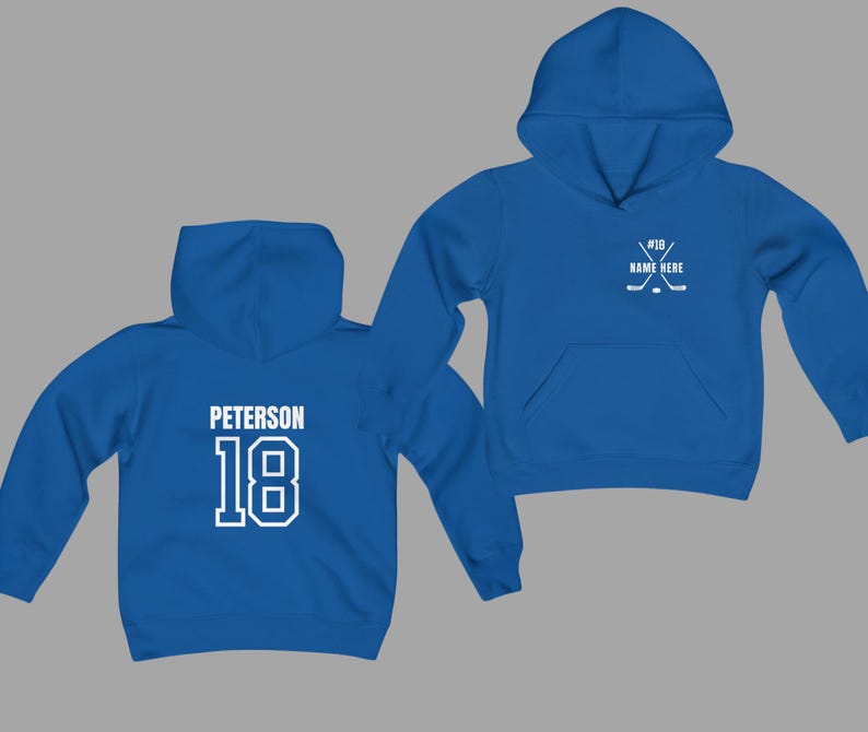May include: Two blue hoodies. One displays "PETERSON" and the number "18" in white block letters on the back. The other hoodie has a hockey stick and puck graphic with the number "18" and space for a name. Both have a hood and a front pocket.