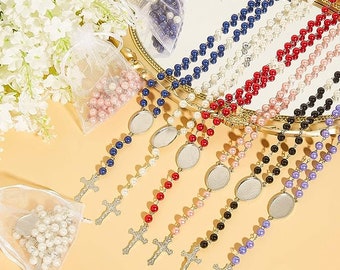 May include: Set of seven colorful beaded rosaries with silver cross charms and decorative medallions. Each rosary features a different color of beads, including blue, red, white, pink, black, and purple.