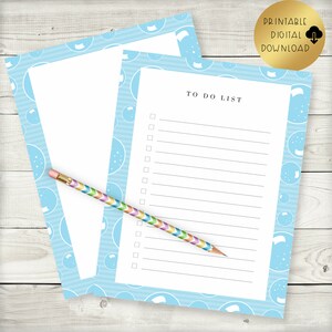 May include: Printable to-do list with a blue background and a pattern of white bubbles. The list has a title that says "To Do List" and 15 lines for writing tasks.