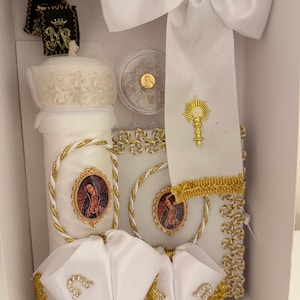 May include: A handmade wooden sign with the text "Welcome" in a whimsical font. The sign is painted white with a distressed finish, and features a decorative floral design in shades of pink and green. It is designed to be hung on a wall.