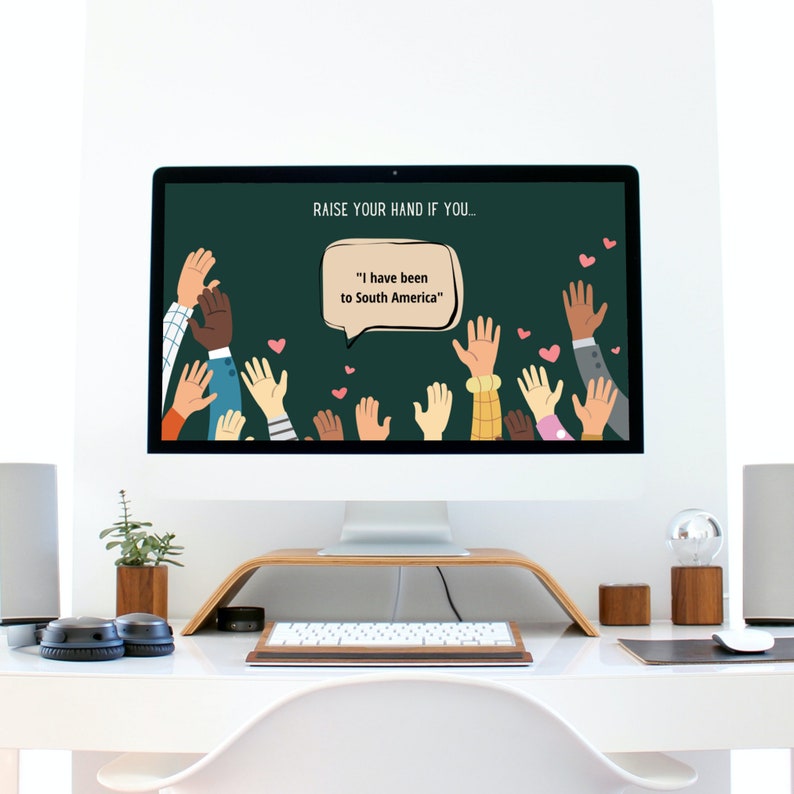 Desktop setup displaying a 'Raise Your Hand If You' game with the prompt 'I have been to South America' on the screen.