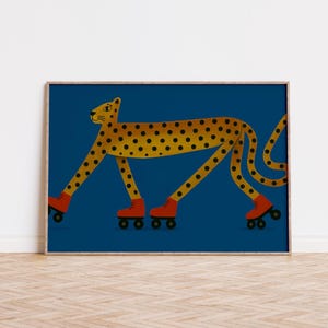 May include: A framed art print depicting a cheetah with a yellow body and black spots, wearing red roller skates. The background is a deep blue colour.