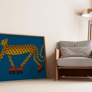 May include: A framed art print depicting a yellow cheetah with black spots, wearing red roller skates, against a deep blue backdrop. The artwork is next to a wooden armchair with a checkered pattern and a modern floor lamp.