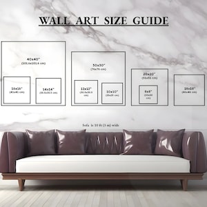 May include: A wall art size guide with dimensions in inches and centimeters. The guide displays various square sizes, including 40x40 inches (101.6x101.6 cm) down to 8x8 inches (20x20 cm). A sofa, approximately 10 feet (3 m) wide, is shown below.