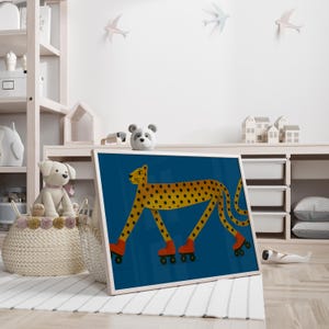 May include: A framed art print depicting a yellow cheetah with black spots, wearing orange roller skates, set against a deep blue backdrop. The artwork is in a white frame, ideal for a child's room or nursery, with a playful theme.
