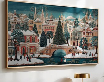 以下が含まれることがあります： 額縁に入ったタペストリーは、ヨーロッパの町の冬の風景を描いています。このアートワークは、雪に覆われた建物、橋、川を特徴としています。青、赤、緑の色使いで、お祭り気分で居心地の良い雰囲気を作り出しています。