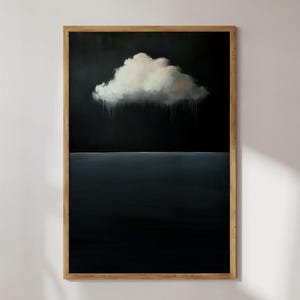 May include: A framed painting of a white cloud with raindrops falling from it, set against a dark blue background. The cloud is positioned above a dark blue horizontal line, representing the sea.