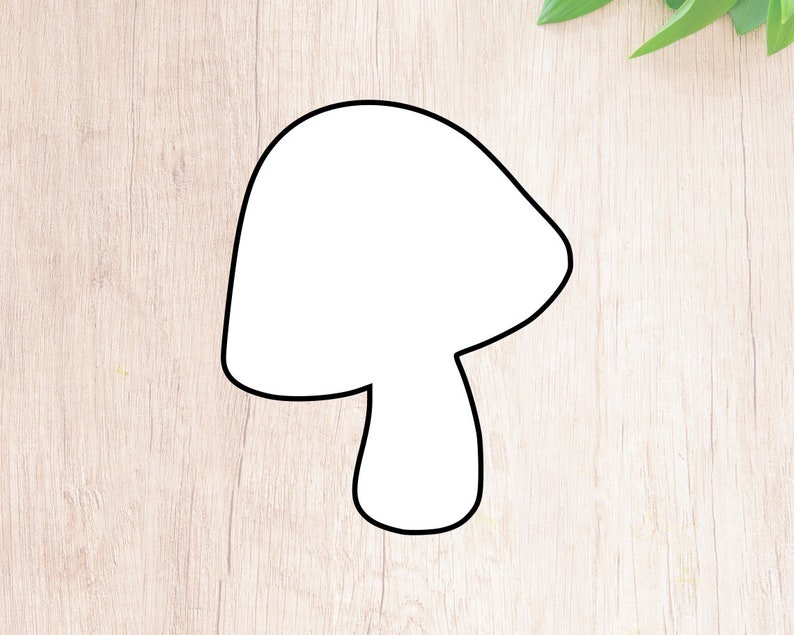 May include: A white outline of a mushroom on a light brown wooden background.