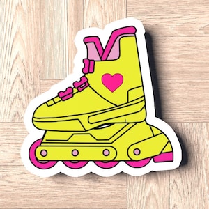 May include: A yellow roller skate sticker with pink detailing. The skate has a pink heart, pink wheels, and pink laces. The sticker is on a white background, placed on a wooden surface.