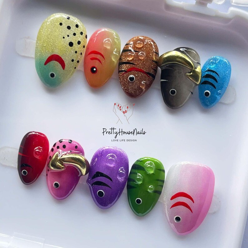 fish nail art, ocean theme nails, colorful press on, cute fake nails, kawaii nail set, summer nail design, handmade press on, festival nail art, fun nail designs, aquatic nail set, quirky fake nails, rainbow press on, unique nail art, holiday nails, party nails, short oval nails