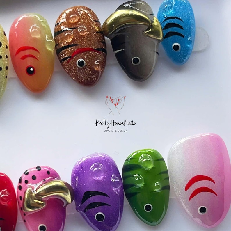 fish nail art, ocean theme nails, colorful press on, cute fake nails, kawaii nail set, summer nail design, handmade press on, festival nail art, fun nail designs, aquatic nail set, quirky fake nails, rainbow press on, unique nail art, holiday nails, party nails, short oval nails