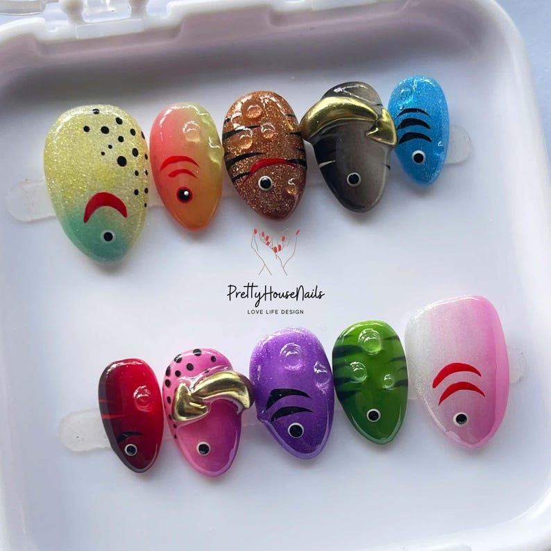 fish nail art, ocean theme nails, colorful press on, cute fake nails, kawaii nail set, summer nail design, handmade press on, festival nail art, fun nail designs, aquatic nail set, quirky fake nails, rainbow press on, unique nail art, holiday nails, party nails, short oval nails