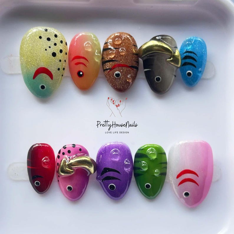 fish nail art, ocean theme nails, colorful press on, cute fake nails, kawaii nail set, summer nail design, handmade press on, festival nail art, fun nail designs, aquatic nail set, quirky fake nails, rainbow press on, unique nail art, holiday nails, party nails, short oval nails