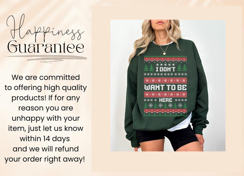K&ouml;nnte beinhalten: Dunkelgr&uuml;nes Sweatshirt mit weihnachtlichem Design. Der Text "I DON'T WANT TO BE HERE" ist in Wei&szlig; und Rot dargestellt. Das Design beinhaltet Schneeflocken und Weihnachtsb&auml;ume. Das Sweatshirt wird mit schwarzen Shorts getragen.
