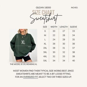 May include: Size chart for a Gildan 18000 sweatshirt, showing measurements in inches for width, length, and sleeve length for sizes S through 5XL. The chart includes the text "Most women find their typical size works best, since sweatshirts are meant to be a bit loose fitting. For an oversized fit, select two or three sizes up."