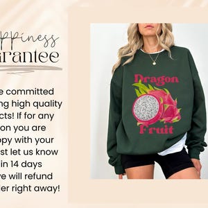 May include: A dark green sweatshirt with a white and pink dragon fruit graphic and the text "Dragon Fruit".