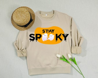 Personalised Halloween family spooky sweatshirts,Spooky-themed oversized sweaters,Haunting sweatshirts with spooky motifs,Halloween-inspired