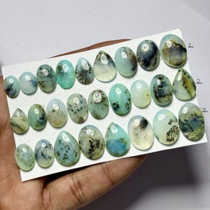 Cabochão de Opala Peruana Natural: Pedra preciosa oval/em formato de pera (11-19 mm, tira de 39,66 quilates)