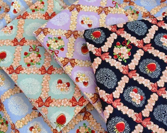 May include: Three different fabric swatches with a repeating pattern of floral bouquets, strawberries, and bows. The fabrics are in shades of blue, purple, and black.