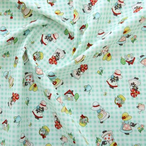May include: A green and white checkered fabric with a repeating pattern of black and white figures wearing hats and holding baskets of flowers. The figures are surrounded by small green flowers, watering cans, and houses.