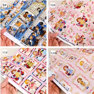 May include: Four fabric swatches with different patterns featuring dolls. The first swatch has a blue and white comic book pattern. The second swatch has a pink background with white tulips and dolls. The third swatch has a pink background with dolls in squares. The fourth swatch has a pink background with dolls in frames.