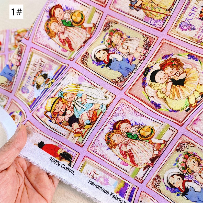 May include: Pink fabric with a repeating pattern of framed illustrations of children in vintage clothing. The fabric has the text "1#" and "100% Cotton. Handmade Fabric" printed on it.