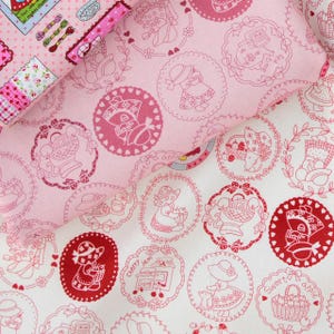 May include: White fabric with a red and pink floral pattern. The fabric features a repeating design of circles with a girl holding a basket of fruit inside each circle. The text "Sweet apple" and "Cherry jam" are visible in the design.