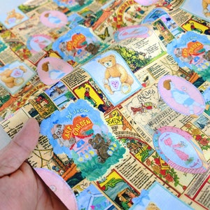 May include: A colorful fabric with a repeating pattern of teddy bears, flowers, and text. The fabric features a light blue background with pink, yellow, and green accents. The text on the fabric includes the words "Art Garden" and "Whislow".