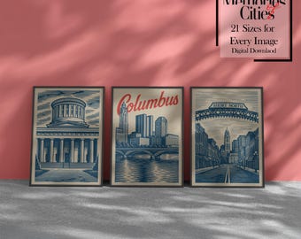 May include: Three framed art prints featuring cityscapes. The prints depict architectural landmarks and city views in blue and beige tones. The middle print says "Columbus" in red script. The text "Memories of Cities" is in the upper right corner.