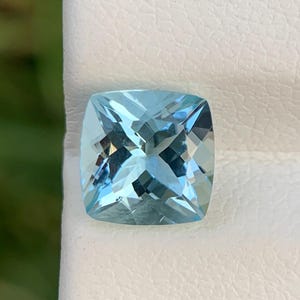 Natural Aquamarine Gemstone: 1.35 Carat Cushion Cut, Sky Blue, Brazil Origin