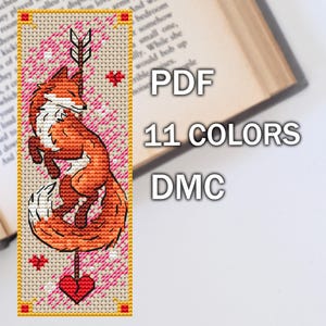 Fox cross stitch bookmark PDF chart featuring orange fox with arrow and red heart on pink patterned background, TourmalinePattern on Etsy.