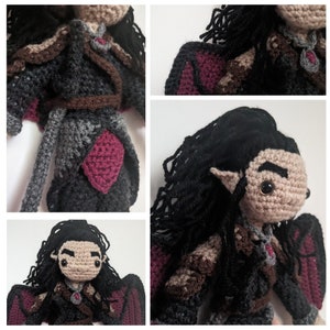 May include: Crocheted doll with long black hair, pointed ears, and a dark grey and brown outfit. The doll is wearing a red gem necklace and has a red gem on its forehead. The doll has wings and is holding a sword.