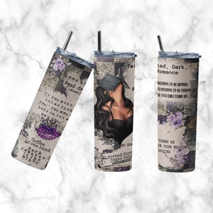 May include: A stainless steel tumbler with a black lid and straw. The tumbler features a design with text and illustrations related to dark romance and reading. The design includes purple floral accents and the words "Coffee in one hand, Dark romance in the other."