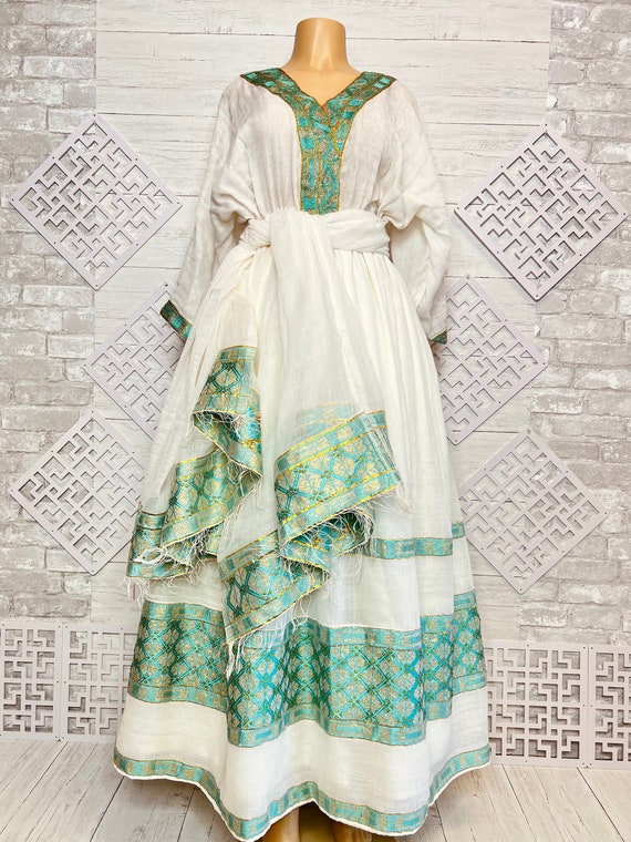 Beautiful Ethiopian and Eritrean Traditional dress|kamis| Zuria Beautiful Ethiopian and Eritrean Traditional dress|kamis| Zuria