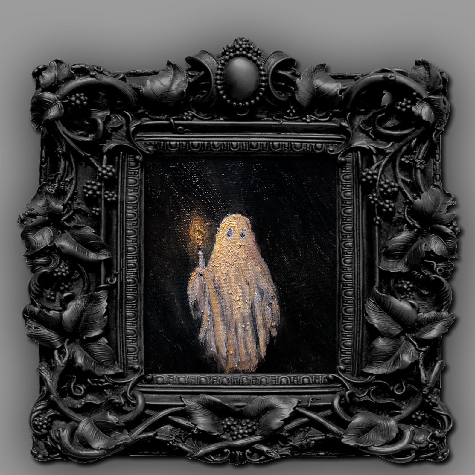 Small ghost holding a candle