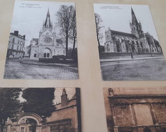 May include: Four vintage black and white postcards featuring different architectural structures. The postcards are on a light brown surface. The first postcard shows a church with a tall spire. The second postcard shows a large cathedral. The third postcard shows a building with a gate. The fourth postcard shows a building with a large archway.