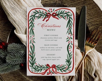 May include: A Christmas menu card with a festive design. The card features a green and red border with a bow at the top and bottom. The menu includes first course, main course, and dessert options. A gold fork and knife are on the right.