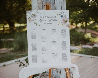 May include: A white wedding seating chart with floral illustrations and the text "Find Your Seat Olivia & William 12th August 2019" at the top. The chart lists tables and guest names.