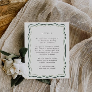 May include: A white card with green and blue borders and the text "DETAILS" in a dark green font. The card has information about a wedding reception, including the location, directions, and a request for no gifts.