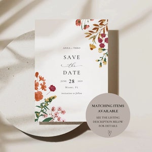 May include: Save the Date card with floral illustrations in shades of pink, orange, and yellow. The text reads "Anna & Theo Save the Date June 28, 2029 Miami, FL Invitation to follow".