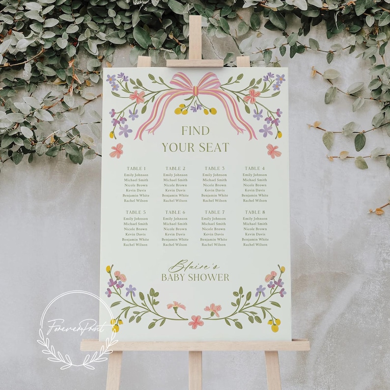 May include: A floral-themed seating chart for a baby shower with a pink bow and the text "Find Your Seat". The chart lists tables 1 through 8 with names for each guest.