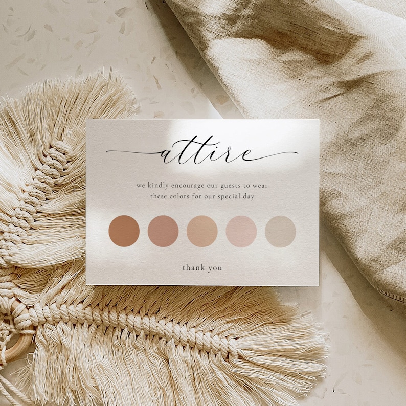 May include: A white card with the word "attire" written in cursive. The card also includes the text "we kindly encourage our guests to wear these colors for our special day" and a row of five color swatches in shades of brown, pink, and beige. The card ends with the text "thank you".