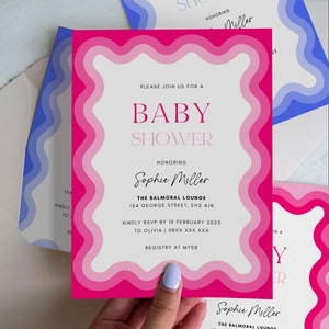 May include: Pink and white baby shower invitation with a wavy border. The invitation says "Please join us for a baby shower honoring Sophie Miller" and includes the location, date, and RSVP information.