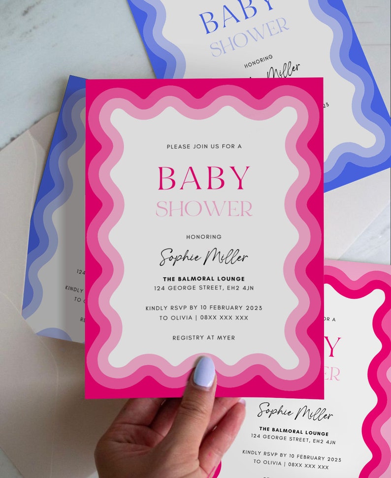 May include: Pink and white baby shower invitation with a wavy border. The invitation says "Please join us for a baby shower honoring Sophie Miller" and includes the location, date, and RSVP information.